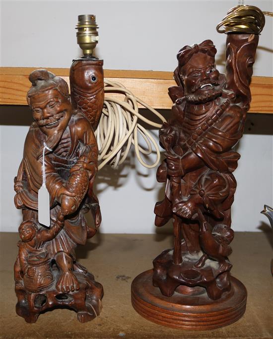 Two Chinese hardwood carved figures fitted as lamps